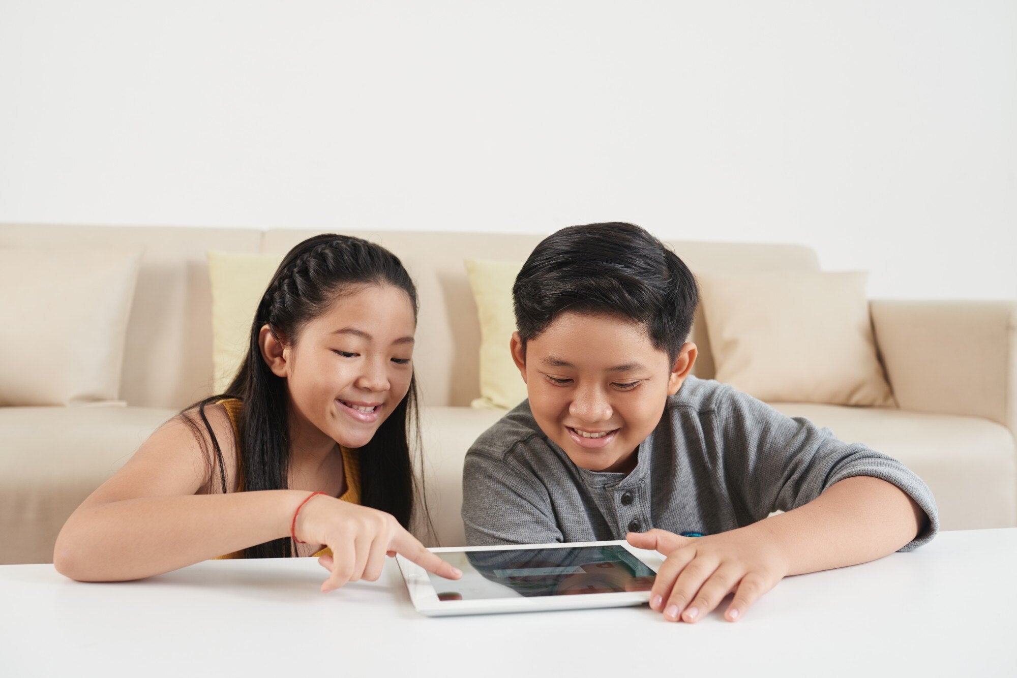 Children focused on their gadget